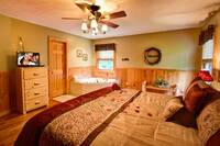 Master Bedroom with tub in this Gatlinburg cabin rental